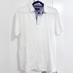Zara Polo shirt worn 1x. Has few spots.light blue trim inside collar.